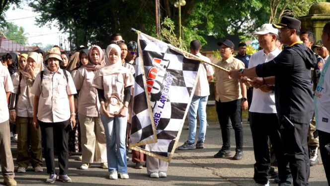 
					May Day Harmonis di Langkat, Ratusan Buruh Meriahkan Gerak Jalan Santai